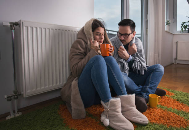 Home in winter with energy-saving tips for reducing heating bills and staying warm.